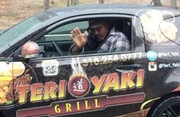 Karl Malone In A Really Small Car