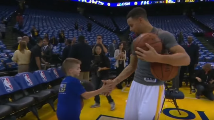 Stephen Curry Does His Pregame Dribbling Routine with a Young Fan