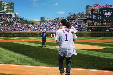 Derrick Rose and Son Throw Out First Pitch at Cubs Game