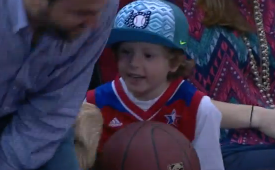Rockets Fan Hands Autographed Hakeem Ball to Kid