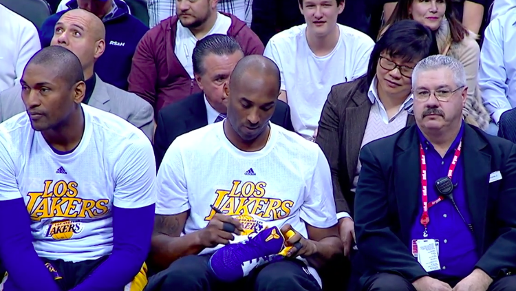 Kobe Bryant Gives Young Fans His Shoes In Last Denver Game