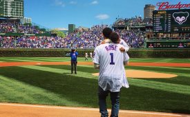 Derrick Rose and Son Throw Out First Pitch at Cubs Game