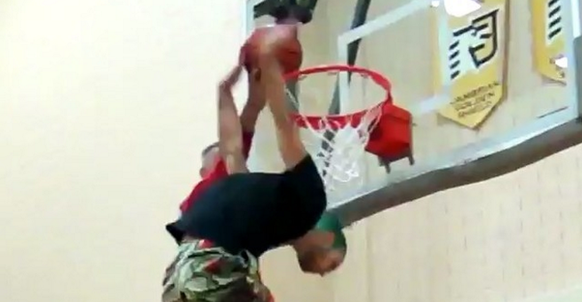 Watch This Crazy Behind the Back Dunk